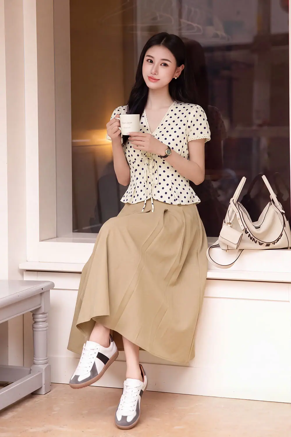 Chân váy xếp ly dáng xòe cạp cao