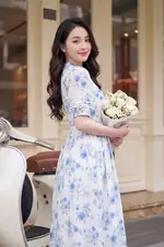 Đầm hoa dáng xòe cổ xẻ V thắt nơ eo