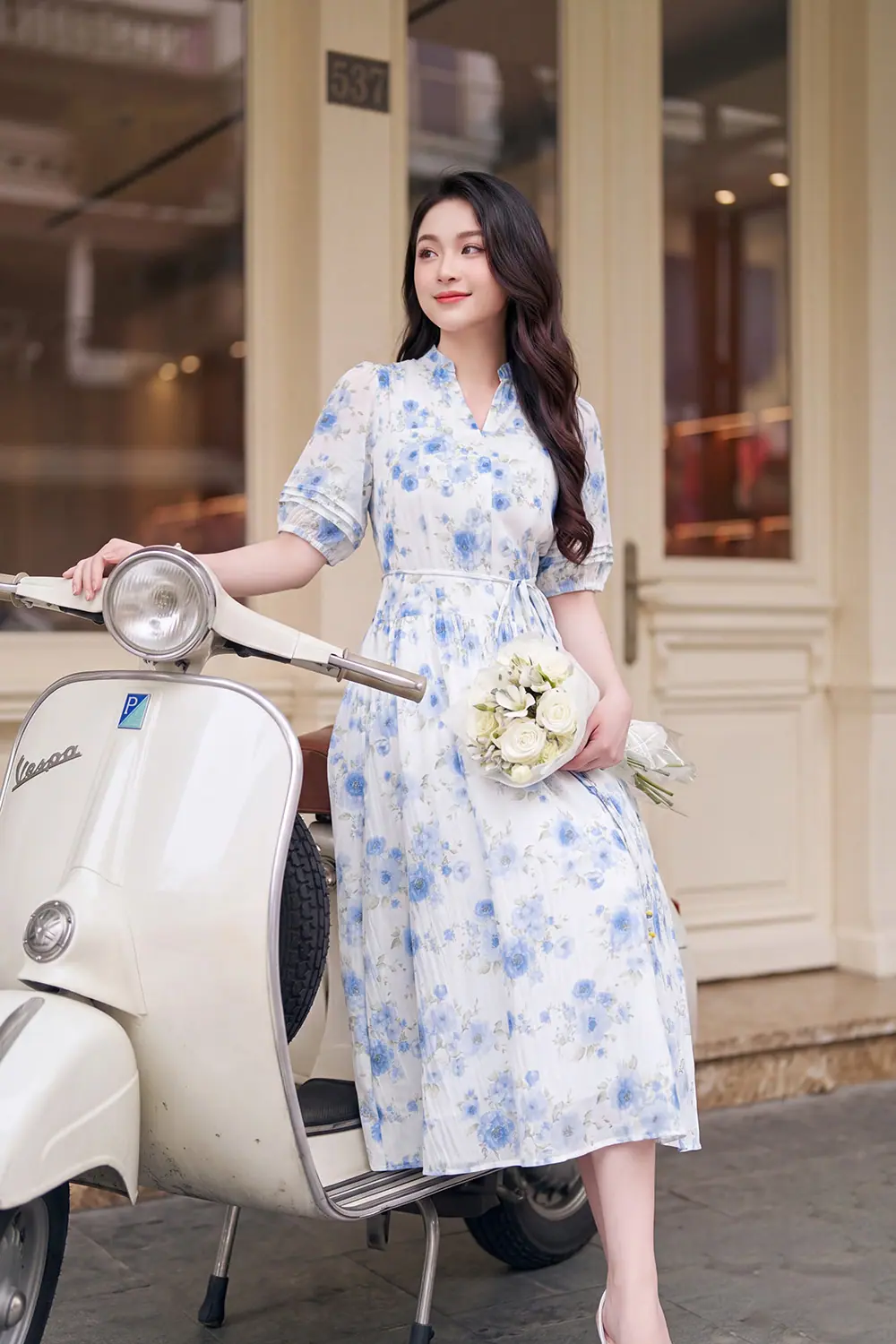 Đầm hoa dáng xòe cổ xẻ V thắt nơ eo