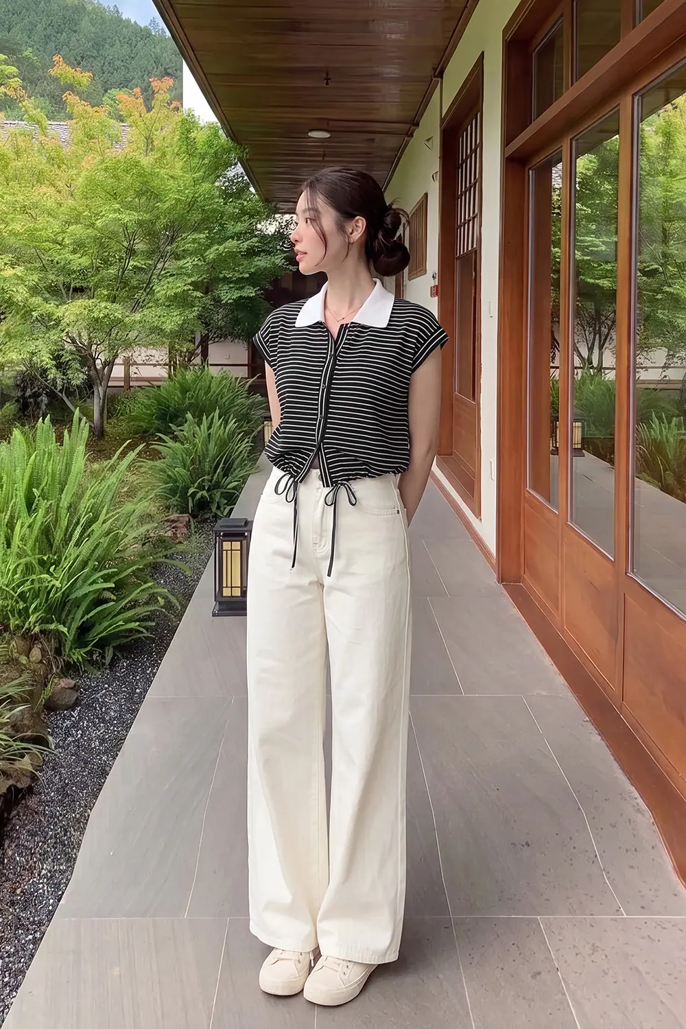 Áo polo nữ sọc đen trắng phối dây rút
