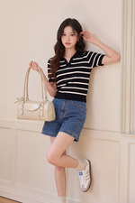 Áo len dệt kim cổ polo đen sọc trắng