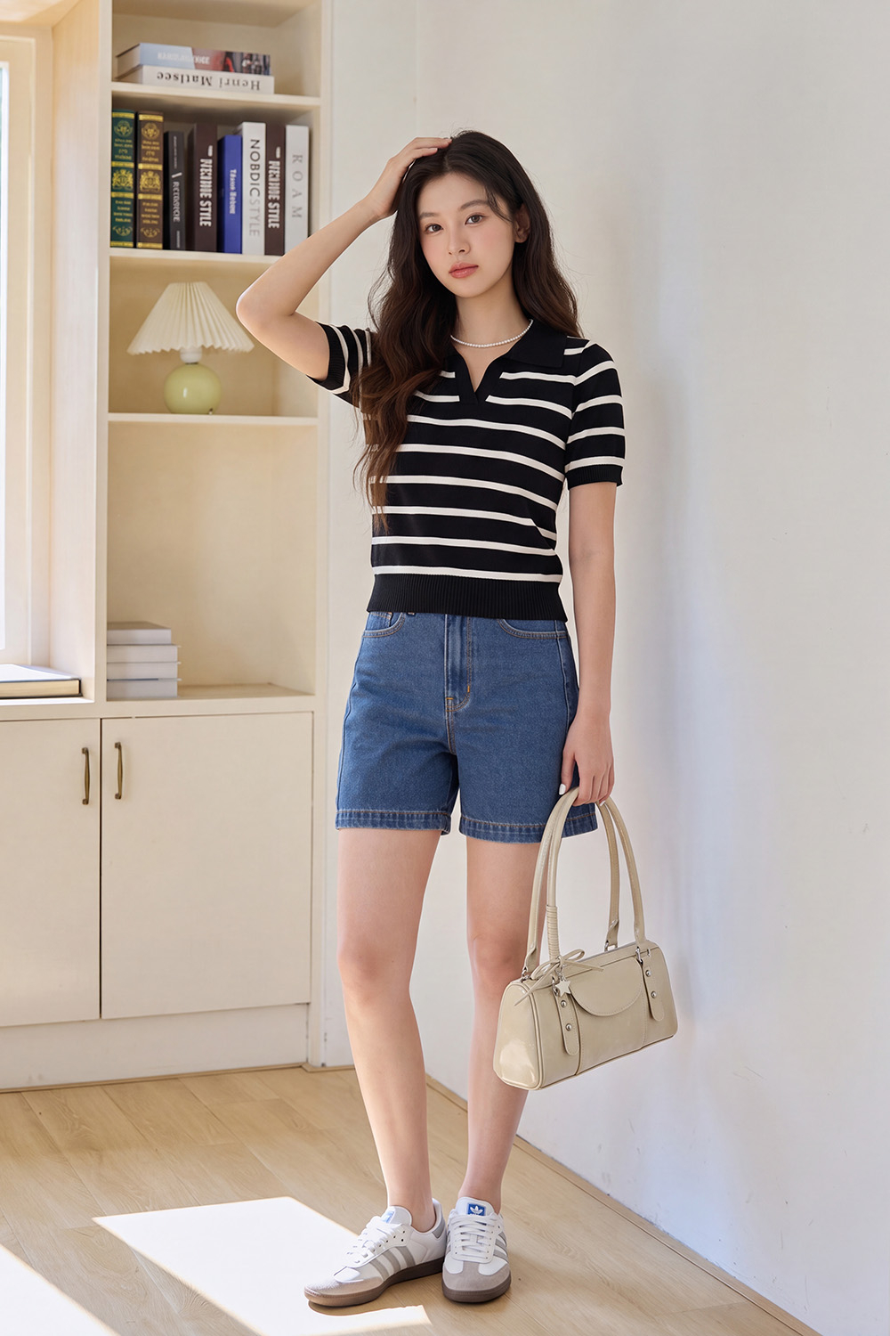 Áo len dệt kim cổ polo đen sọc trắng