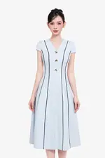 Đầm xòe chữ A màu xanh viền đen đính nút