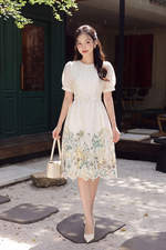 Đầm trắng xô thêu hoa dáng xòe tay phồng