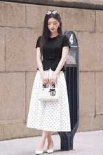 Áo peplum công sở nữ cổ tròn đính nơ