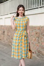 Đầm caro chữ A tùng đắp chéo thắt nơ eo