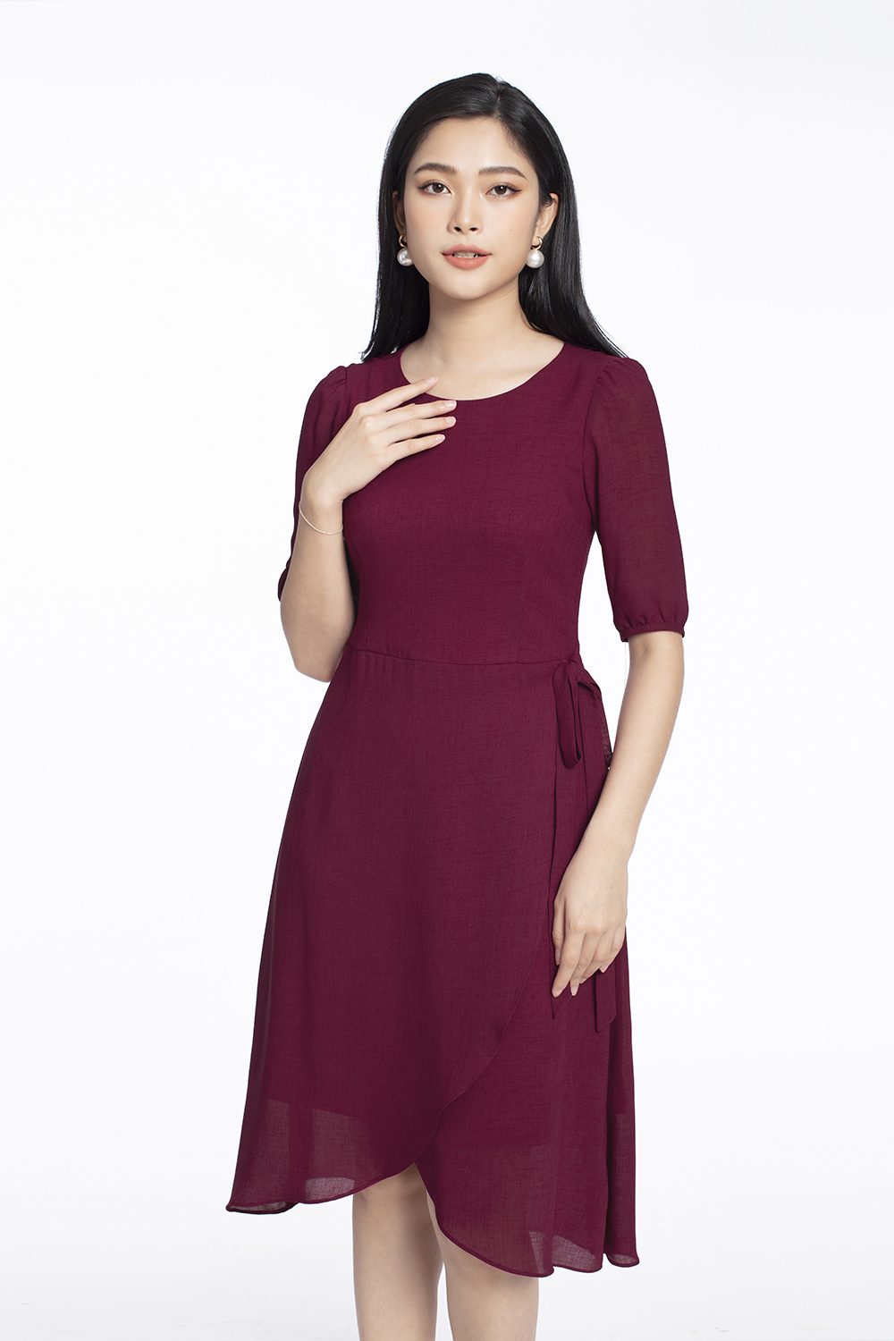 Đầm chữ A tùng váy đắp xéo phối nơ eo 