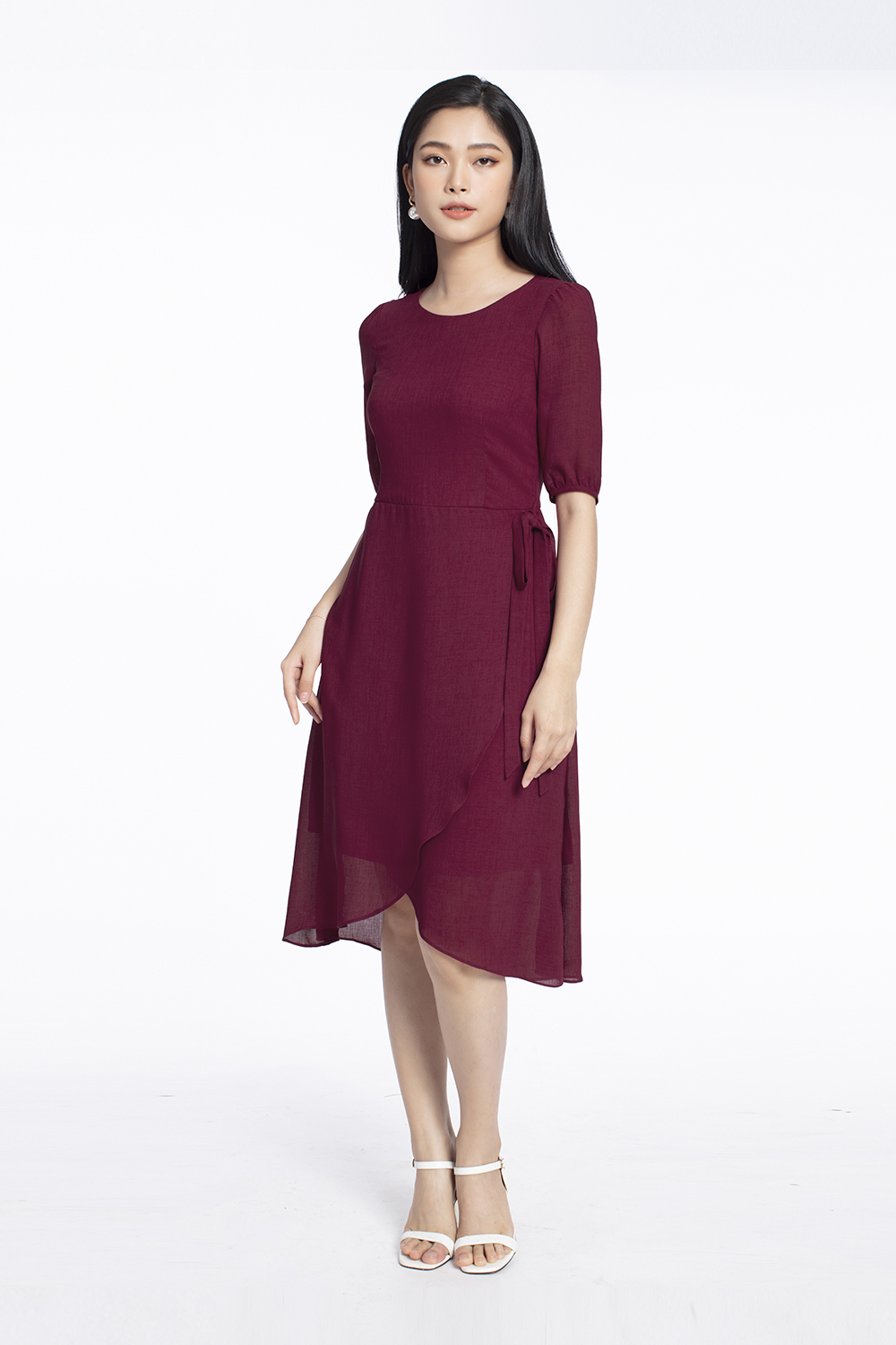 Đầm chữ A tùng váy đắp xéo phối nơ eo 