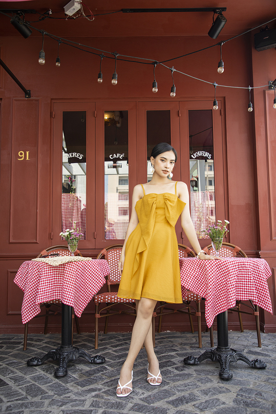 đầm xòe hai dây màu vàng HL15-29