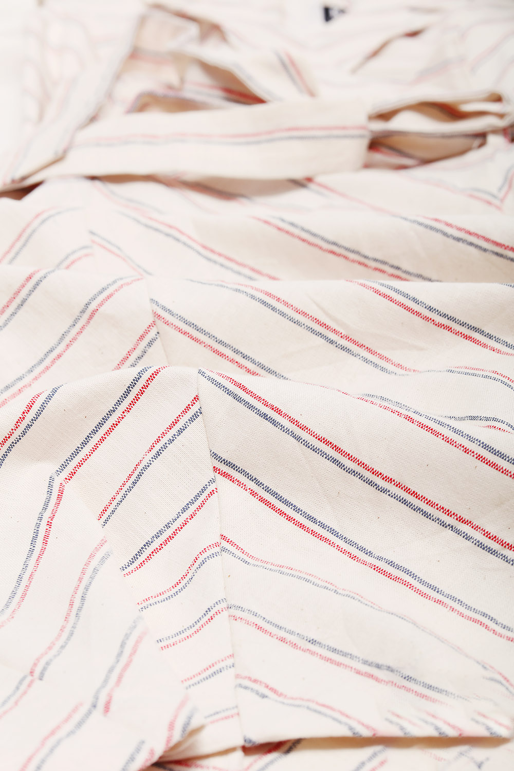 Đầm kẻ phối dây nơ eo cổ đan tông 