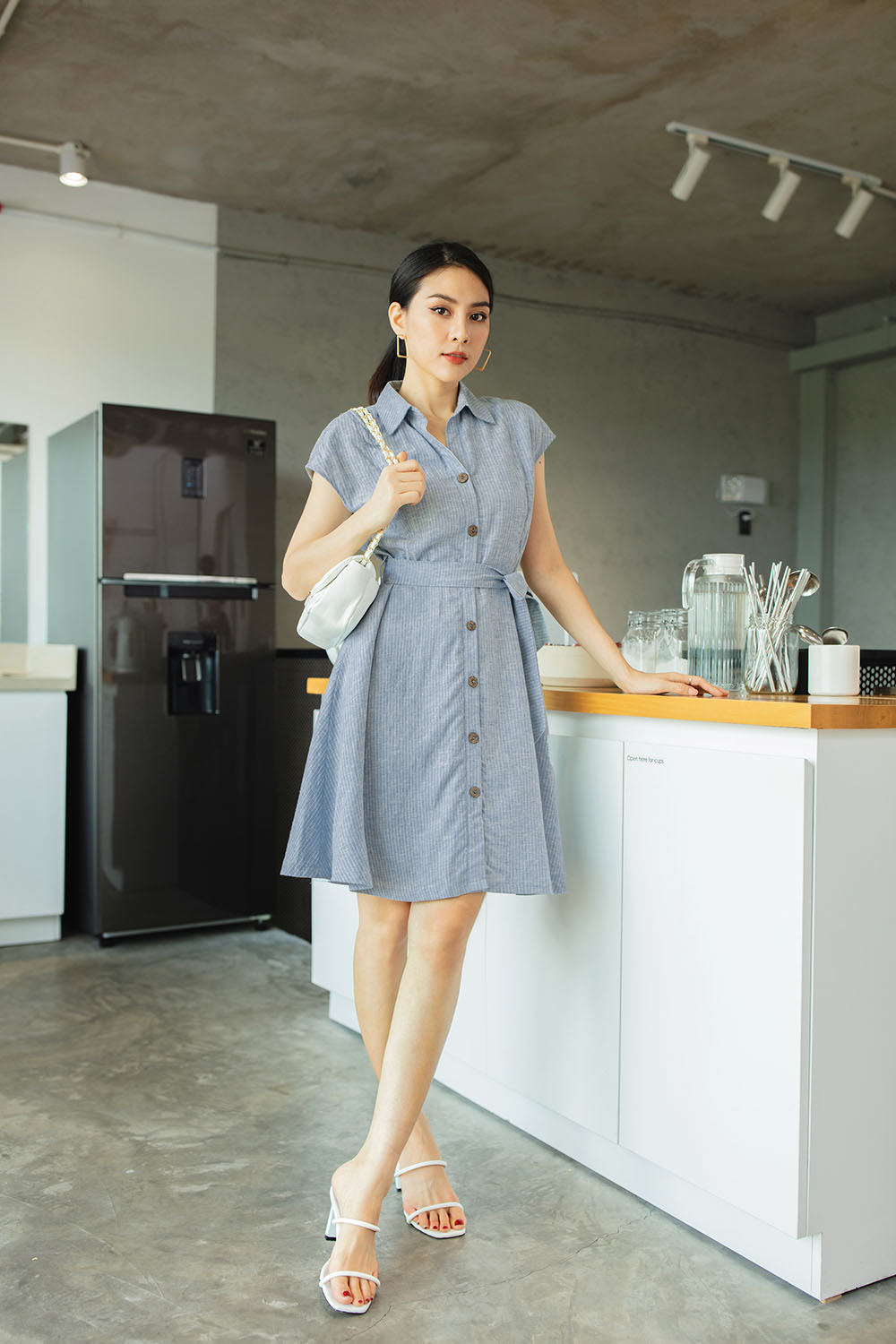 Đầm sơ mi họa tiết kẻ phối nơ 