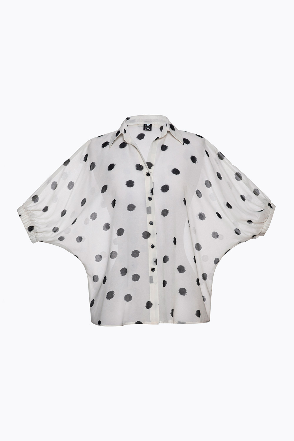Áo sơ mi trắng chấm bi đen